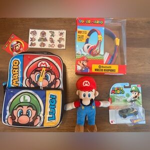 Mario Bros lot of items lunchbox, plush, headphones, car, and tattoos all NEW